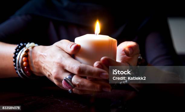 Hands Holding A Candle Stock Photo - Download Image Now - Burning, Candle, Candlelight