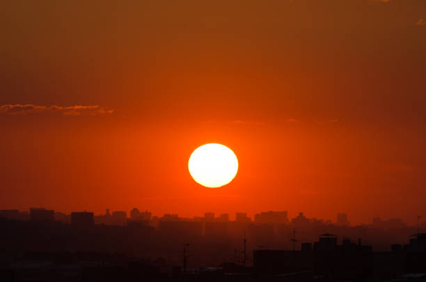 istock Sunset over city 833585848