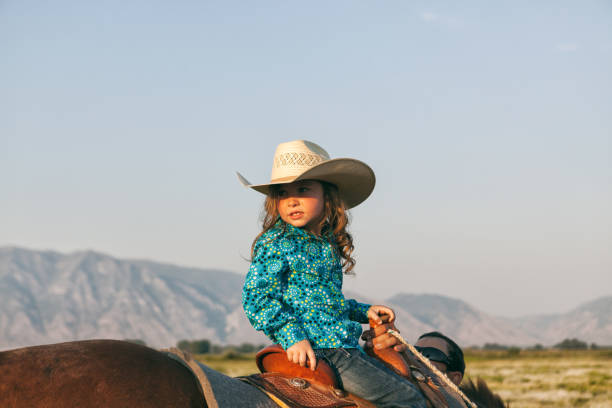 istock little cowgirl 833586008