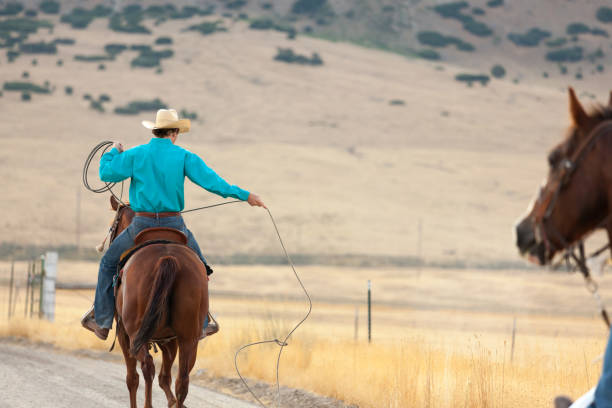 istock man riding a horse 833600560