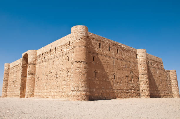 istock ancient desert castle with blue sky in background in Jordan 833628792