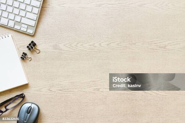 Top View Wooden Office Desk With Computer And Supplies Stock Photo - Download Image Now