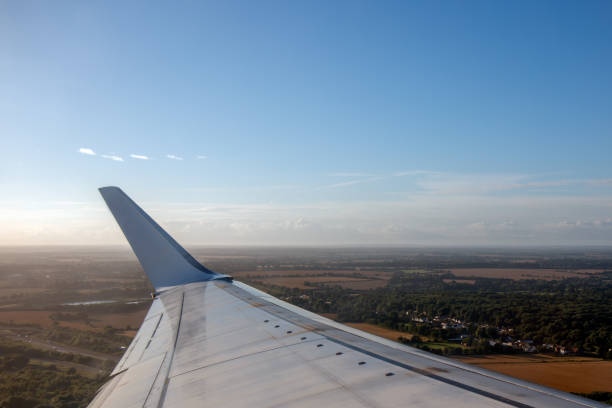 istock Wing of an airplane. 833695812