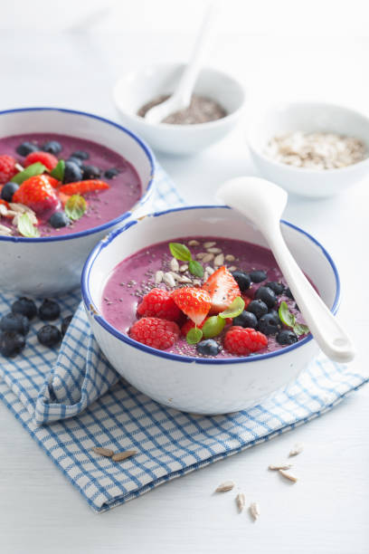 istock healthy berry smoothie bowl with strawberry blueberry raspberry and chia seed 833723020