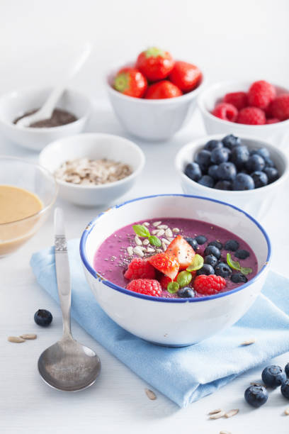 istock healthy berry smoothie bowl with strawberry blueberry raspberry and chia seed 833723098