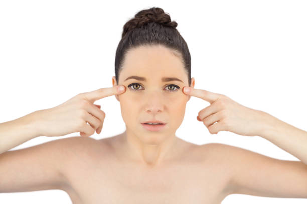 istock Natural model showing crows feet on her eyes 833723330