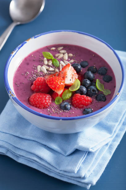 healthy berry smoothie bowl with strawberry blueberry raspberry and chia seed