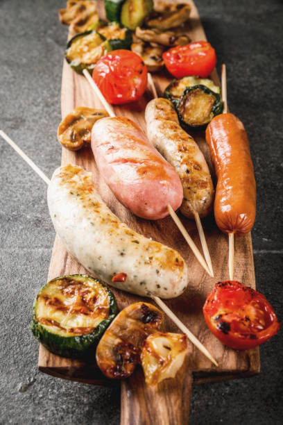 istock Grilled sausages and vegetables 833736274