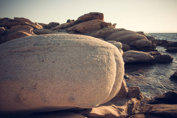 Beautiful rocky shore in Greece while sun rising