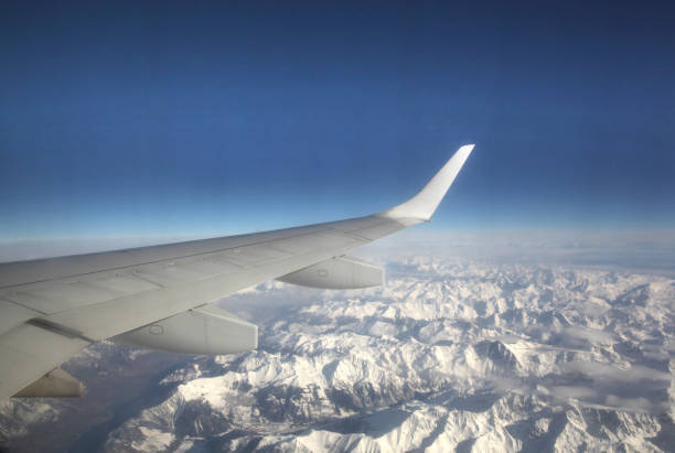 istock View of the Alps from a passenger plane 833744238