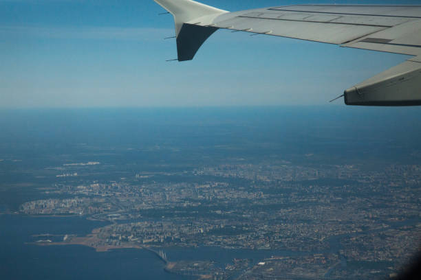 istock Sky airplane window high angle view window city 833744978