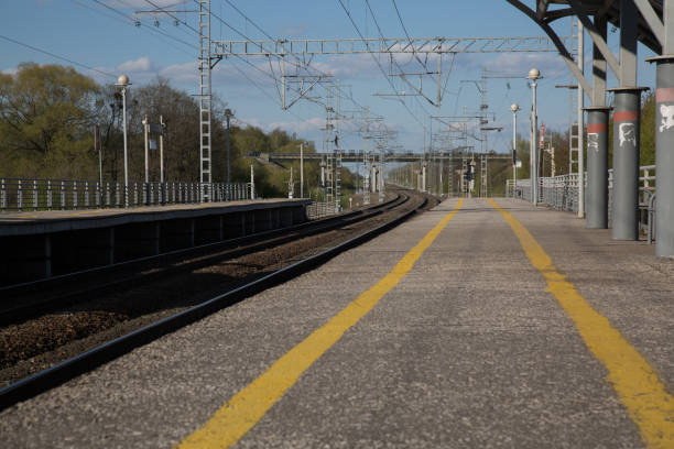 istock Empty railway station outdoor blue sky village 833747848