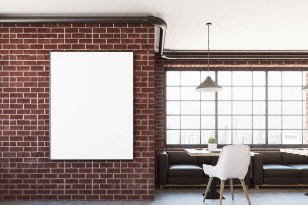 istock Brick cafe interior with a vertical poster, closeup 833752600