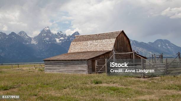 Moulton Barn Located In Mormon Row Gros Ventre River Valley In Grand Teton National Park And Active Cloudy Sky In Background Stock Photo - Download Image Now