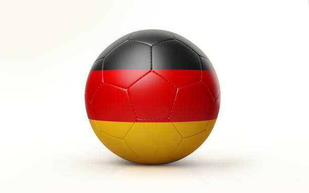 Photorealistic 3d render of a soccer ball textured with German flag isolated on white background. Soccer ball is lit by the upper left corner of the composition and casting shadows on white ground. Horizontal composition with copy space. Clipping path is included.