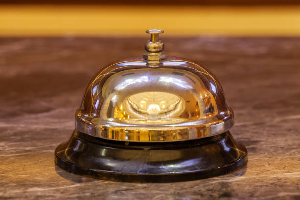 istock an old hotel bell on a marble stand 833785924