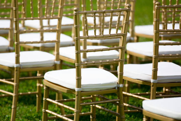 istock gold and whiteChairs for wedding ceremony 833832356