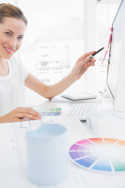 istock Side view portrait of female photo editor working on computer 833851708