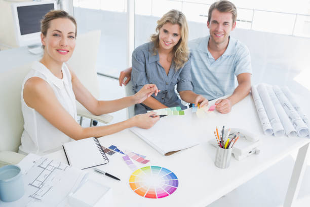 istock Group of artists working on designs 833852188