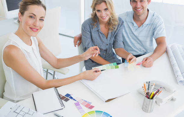 istock Group of artists working on designs 833852226