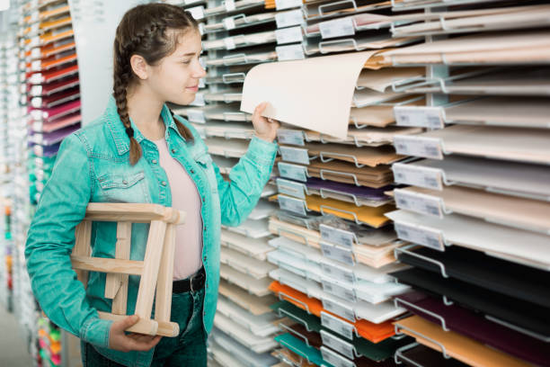 istock Smiling girl shopping multicolored paper 833901112