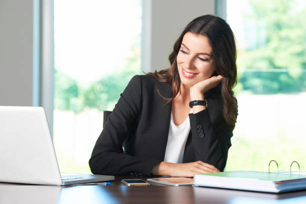 istock Thinking young businesswoman in the office 833901470