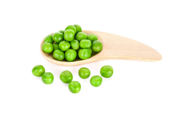 istock fresh green peas isolated on a white background 833916824