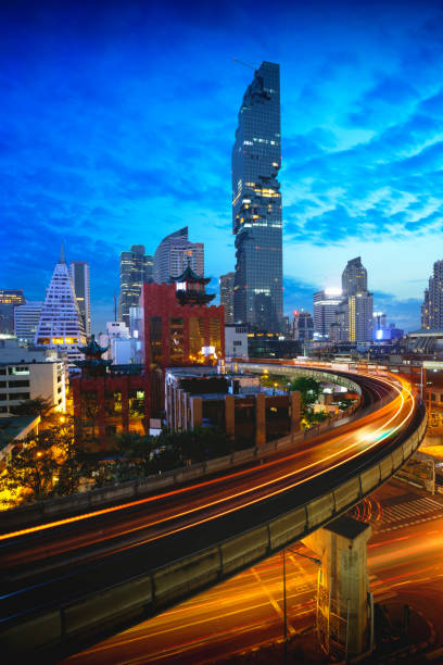 Bangkok city skyline BTS skytrain and Mahanakhon building in background at silom road, Bangkok Thailand silom stock pictures, royalty-free photos & images