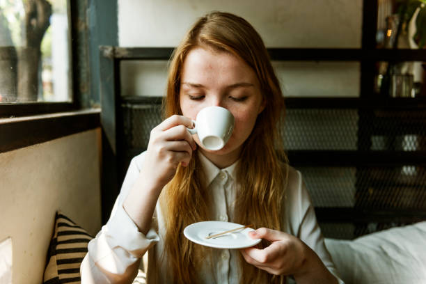 istock Girl Drinking Coffee Shop Concept 833970552