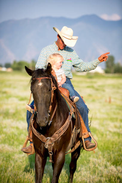 istock Cowboy Dad and Two Year Old Girl 833990492