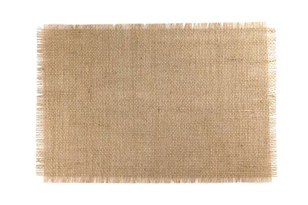 Photo of Burlap Fabric isolated on white background