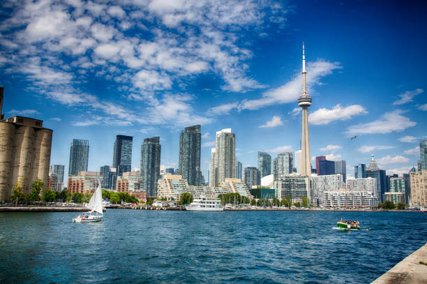 Toronto, Ontario, Canada, August 12, 2016: Toronto as seen from Lake Ontario. The city continues building as a housing boom pushes prices ever higher. stock photo