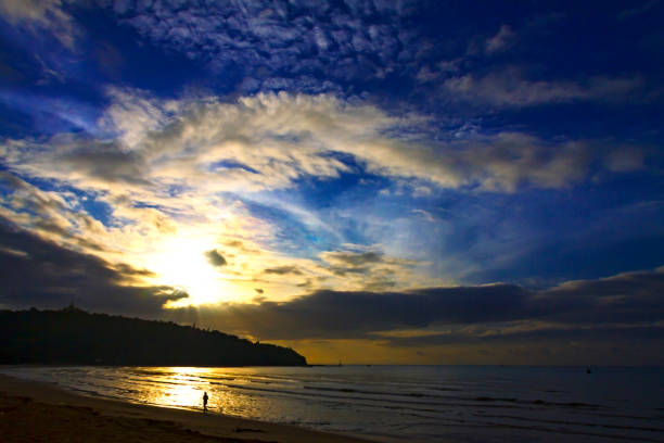 istock Sunrise with silhouette mountain the beach Ban Krut Beach 834053884