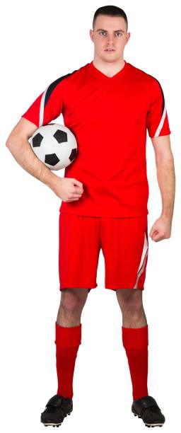 istock Handsome football player looking at camera 834114718