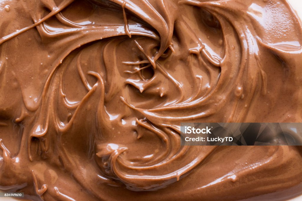 chocolate hazelnut spread on plate. Close up and background Chocolate Stock Photo