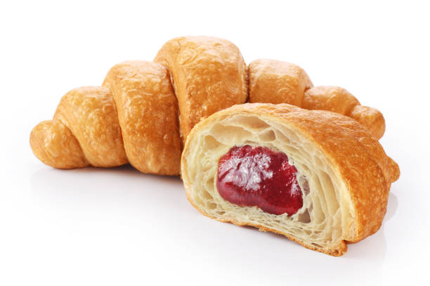 istock Sliced croissant with strawberry jam isolated on white background. 834172902