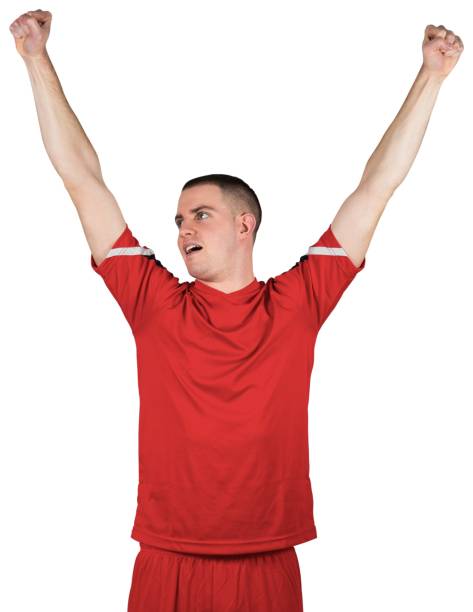 istock Excited football player cheering 834177094