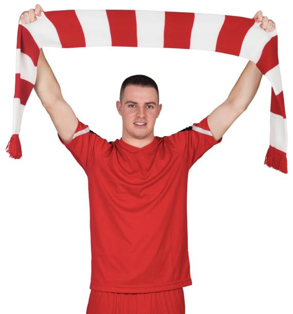 istock Football player holding striped scarf 834178102