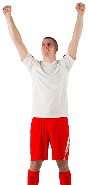 istock Excited football player cheering 834181520