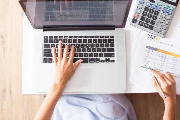 istock Cropped View of Accountant Working on Laptop 834184986