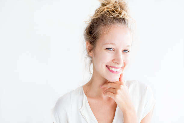 Smiling Young Lovely Woman Touching Chin