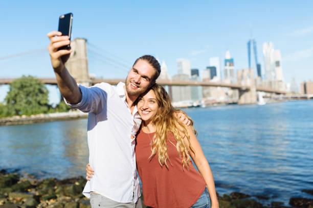 istock Young couple in NYC 834186576