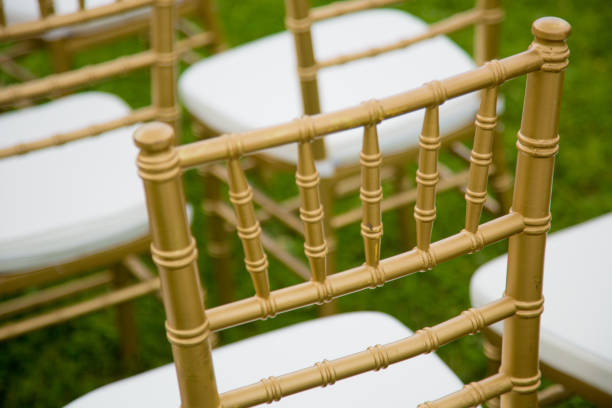 istock gold and whiteChairs for wedding ceremony 834190074
