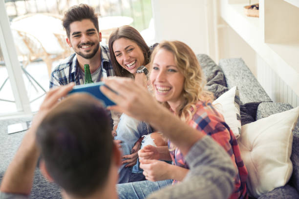 istock Friends having fun at home 834191566