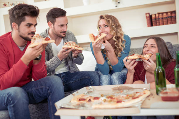 istock Friends having fun at home 834191570