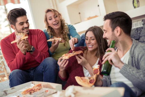 istock Friends having fun at home 834191596