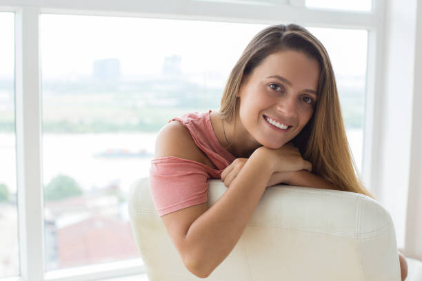 istock Smiling beautiful girl looking at camera 834218440