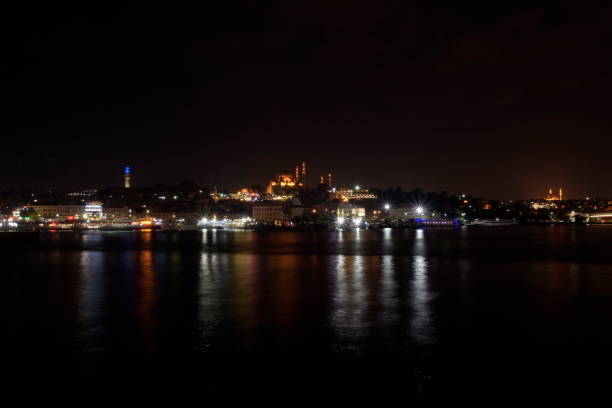 istock Istanbul skyline from Galata bridge at night, long exposure, Turkey 834256614