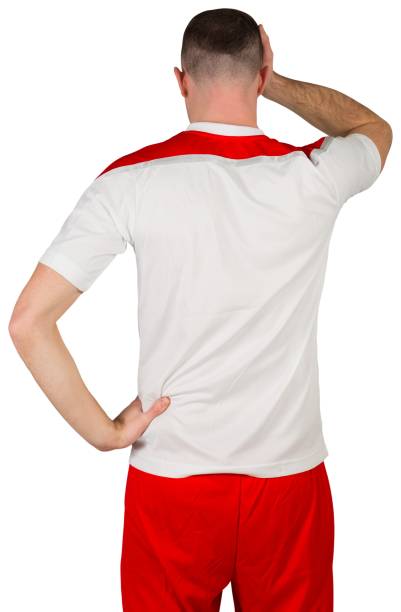 istock Disappointed football player looking down 834263164