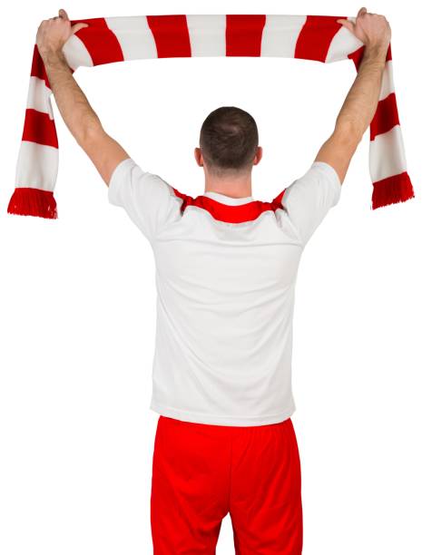 istock Football player holding striped scarf 834263230
